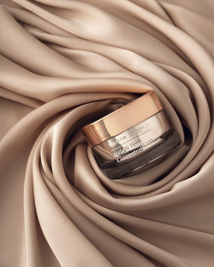 Cream still life product photography, AI-generated and human-retouched