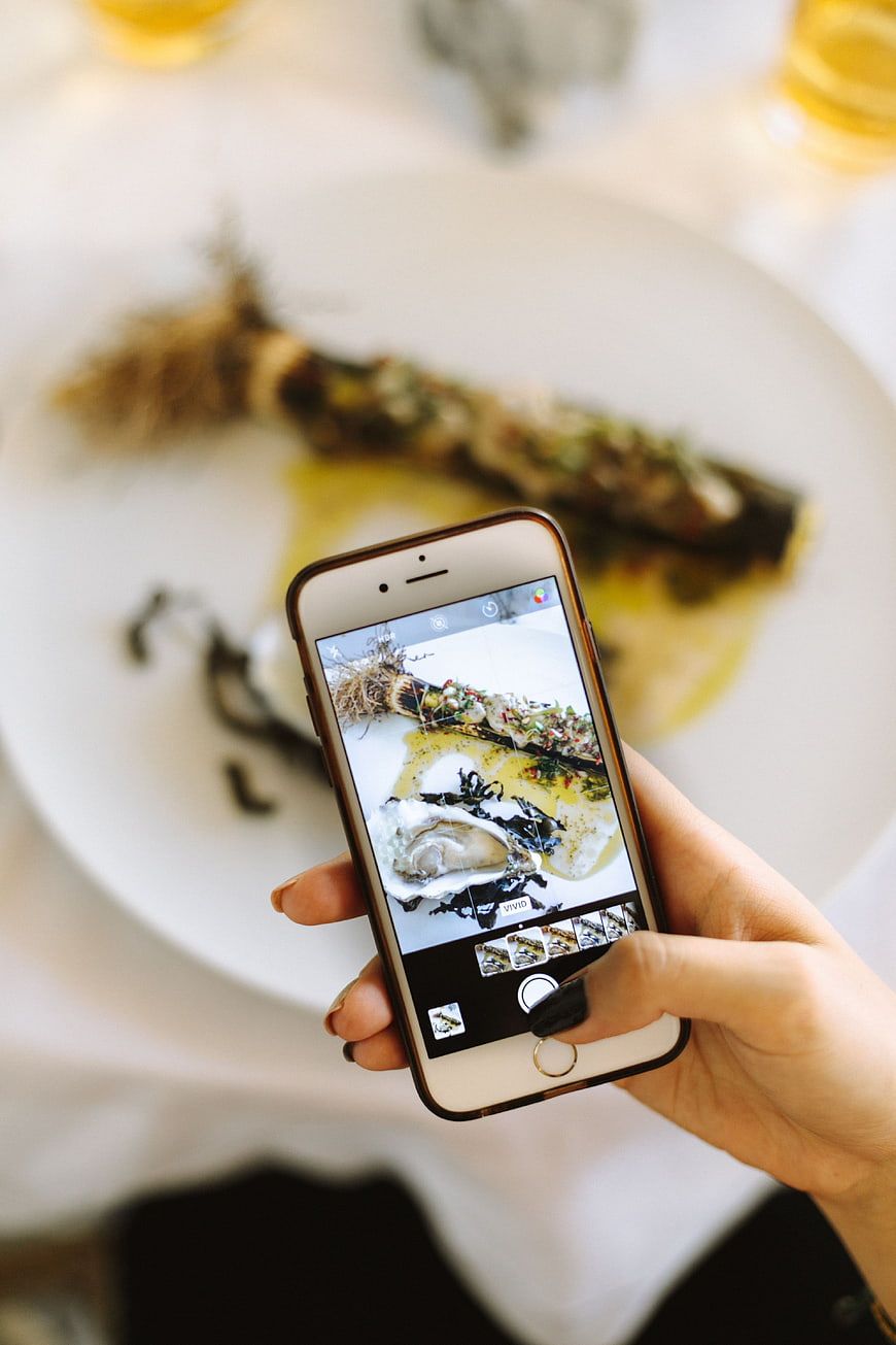 Smartphone photographing a product — the only input Picturist needs